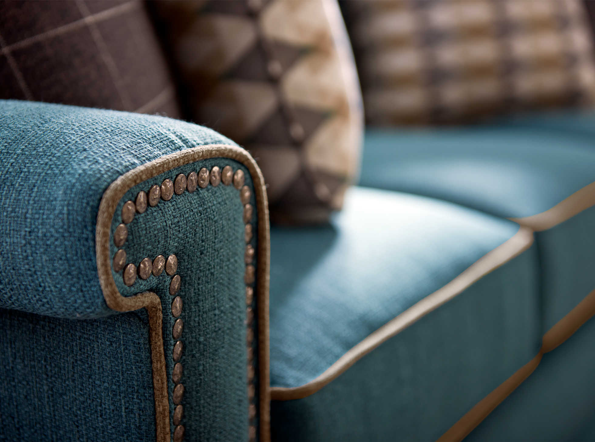 Living room with York Sofa with custom nailhead trim, welt and pillows